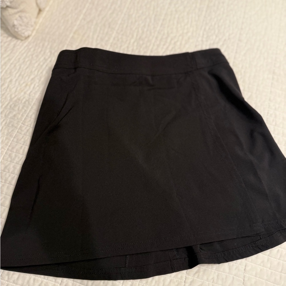 Black Rip Skirt ; worn only once; excellent for travel